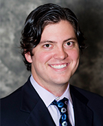 A headshot of Jonny Baker.