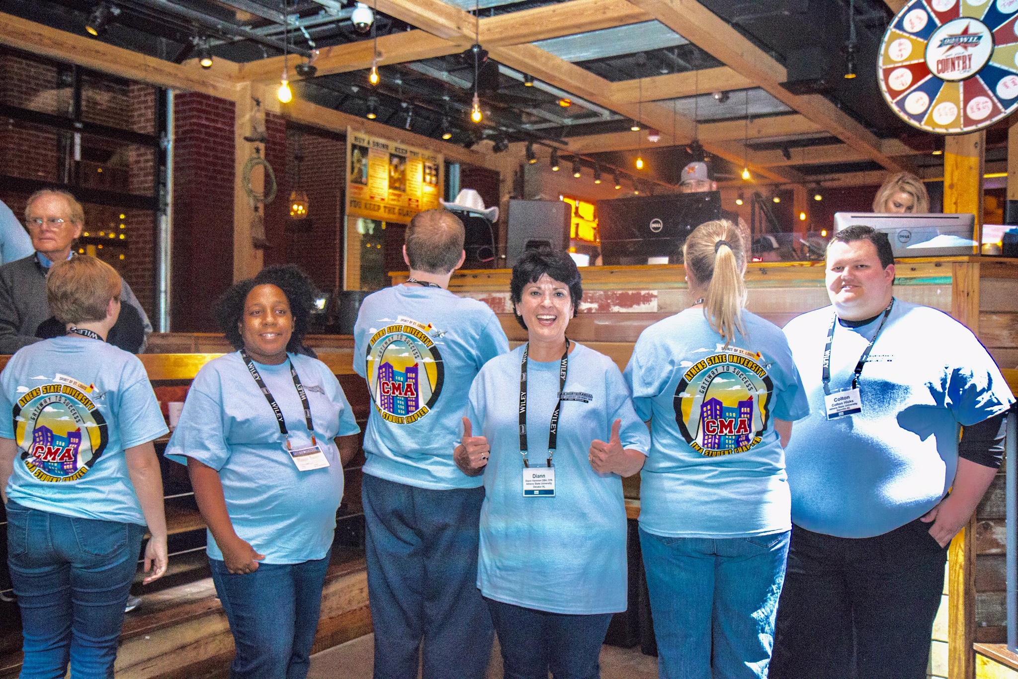 A group of people smiling at an outing