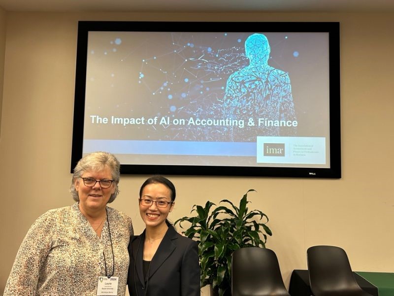 Laurie Burney and Susie Duong at the IMA Doctoral Colloquium