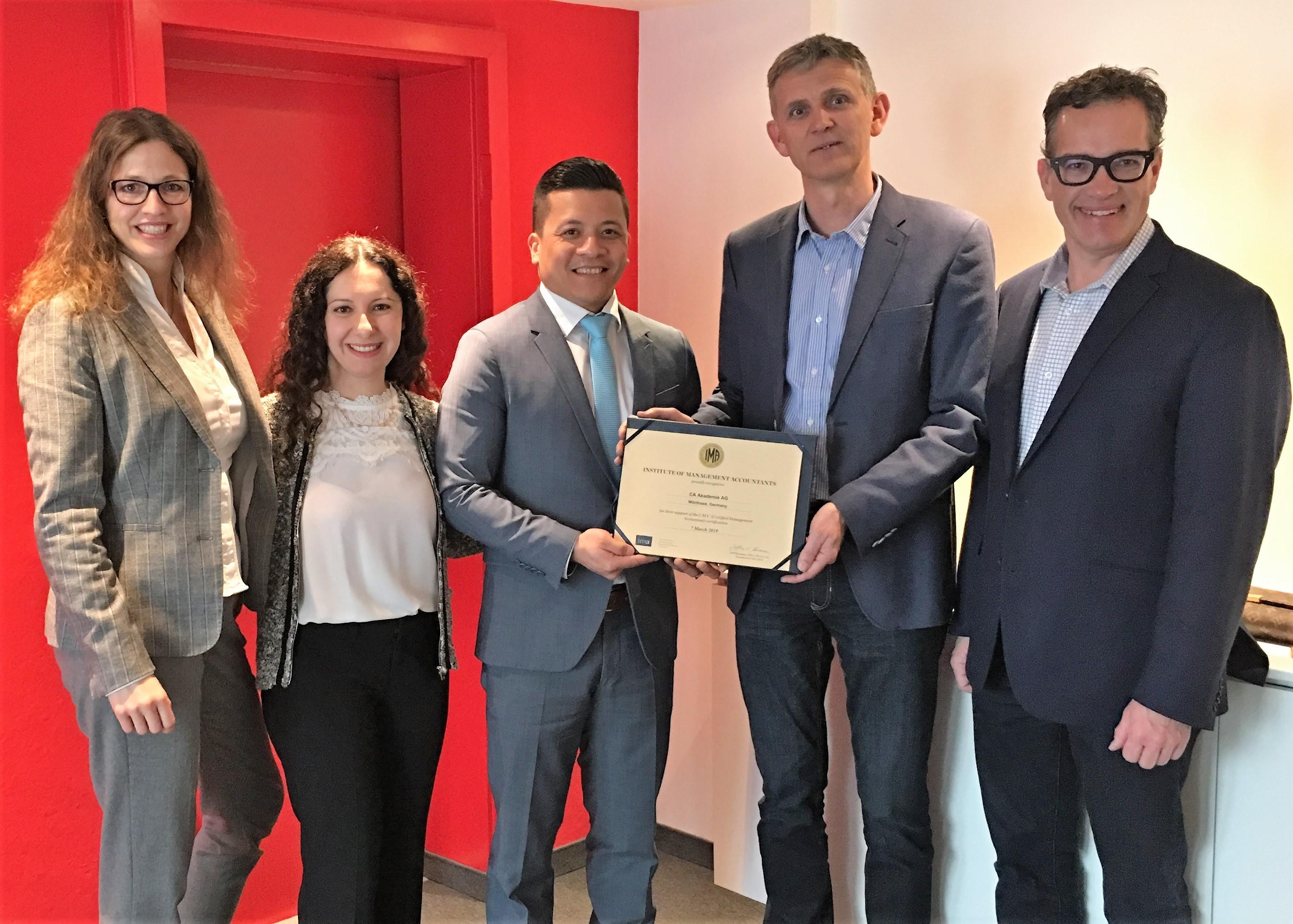 Dorothee Deyhle (from Controller Akademie); Ellen Gurevich, IMA vice president; Bernardin Generalao, IMA manager of business development; Dietmar Pascher (from Controller Akademie); and Jim Gurowka, IMA senior vice president.