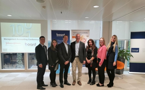 Conference presenters gather for a group photo