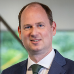 A headshot of Alain Mulder of IMA Europe