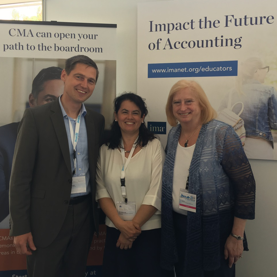 IMA Honorary Professor in Management Accounting, Prof. Dr. Klaus Moeller of University of St. Gallen, Switzerland; Nina Michels-Kim; and co-author of IMA new textbook, C.J. McNair-Connolly at IMA booth