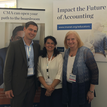 IMA Honorary Professor in Management Accounting, Prof. Dr. Klaus Moeller of University of St. Gallen, Switzerland; Nina Michels-Kim; and co-author of IMA new textbook, C.J. McNair-Connolly at IMA booth