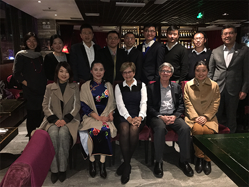 Doreen Remmen and Dennis Whitney meet with chapter leaders in China.