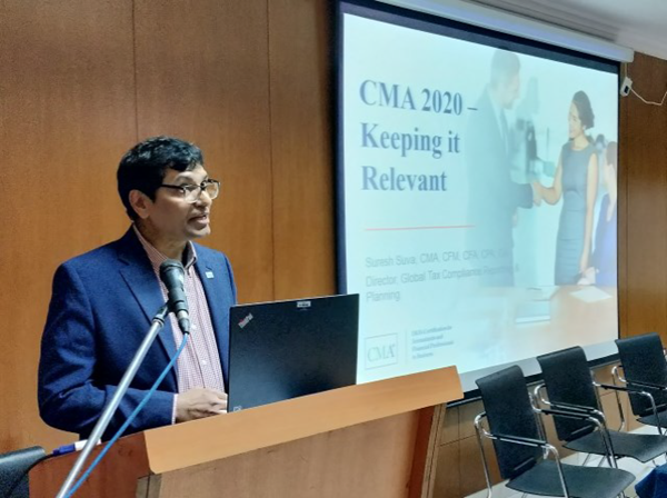 IMA staff member Suresh Suva delivers a presentation on CMA 2020 to the Bangalore Chapter.
