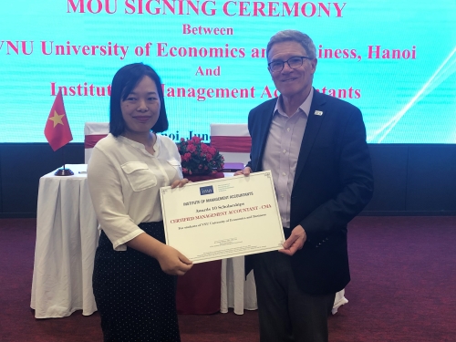 Whitney and Dr. Nguyen Thi Hong Thuy, VNU?s dean of the faculty of accounting and auditing.