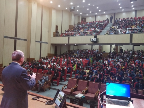 Thomson addresses a large group of students at Christ University