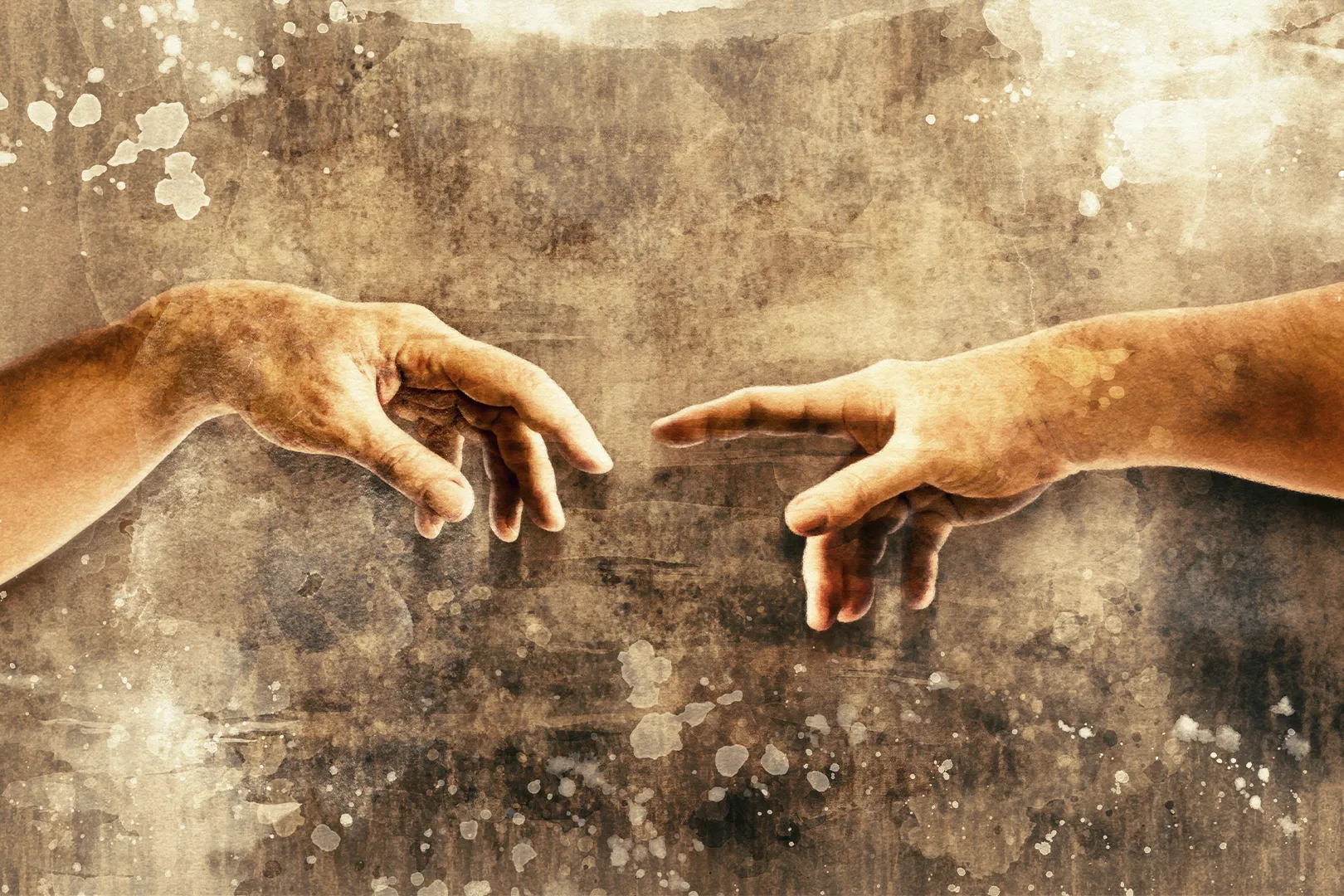 A photo of two hands reaching out about to touch each other