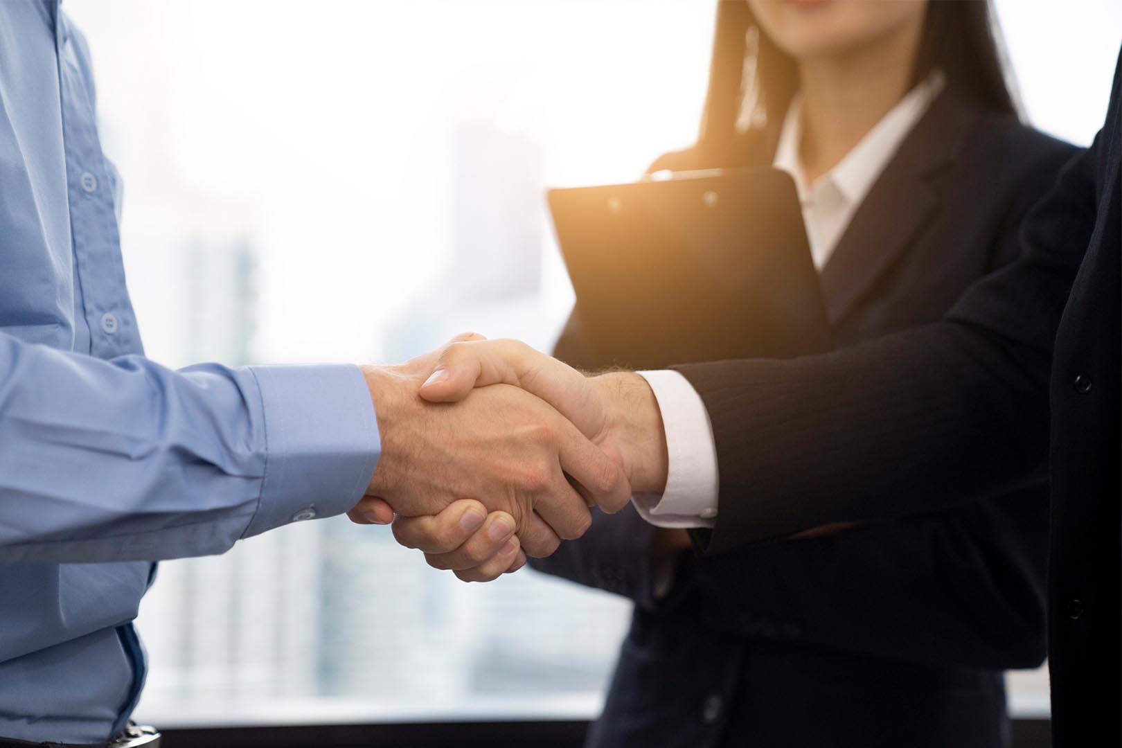 two business people shaking hands