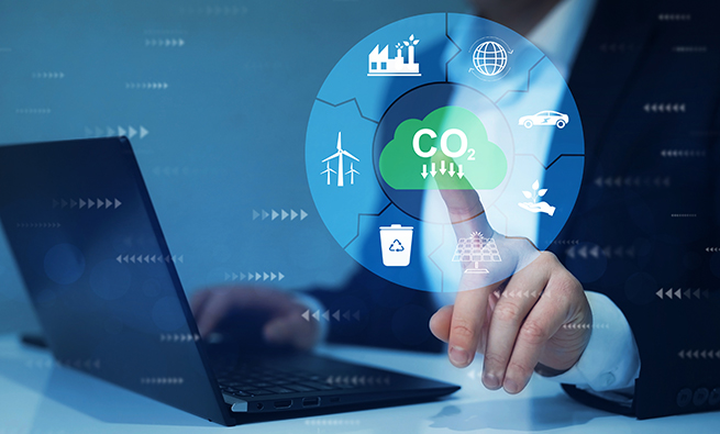 Abstract photo of a man working with a laptop and touching sustainability symbols 