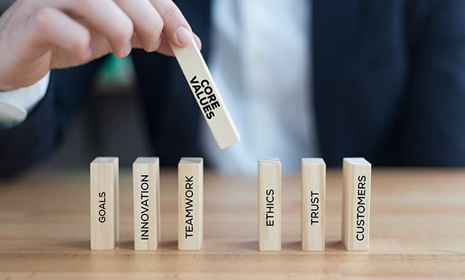 a person moving parts of a wooden object