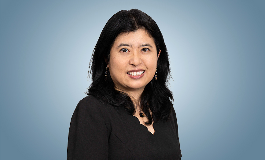 Headshot of Sophia Toh, an executive coach and CEO of Illuminate U Coaching