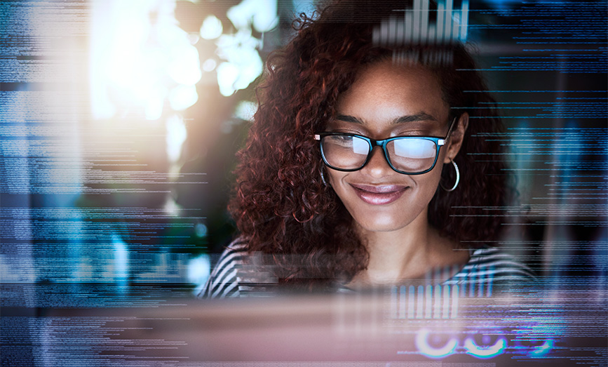 A woman working in front of a set of data